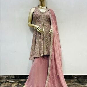 Pink Embellished palazzo set with heavy dull gold embroidery halter neck top
